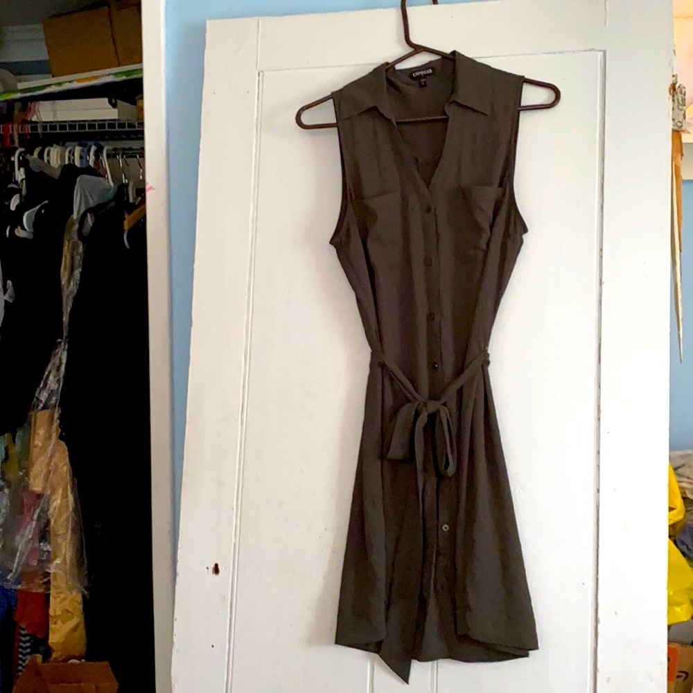 Express button up dress with belt around waist.